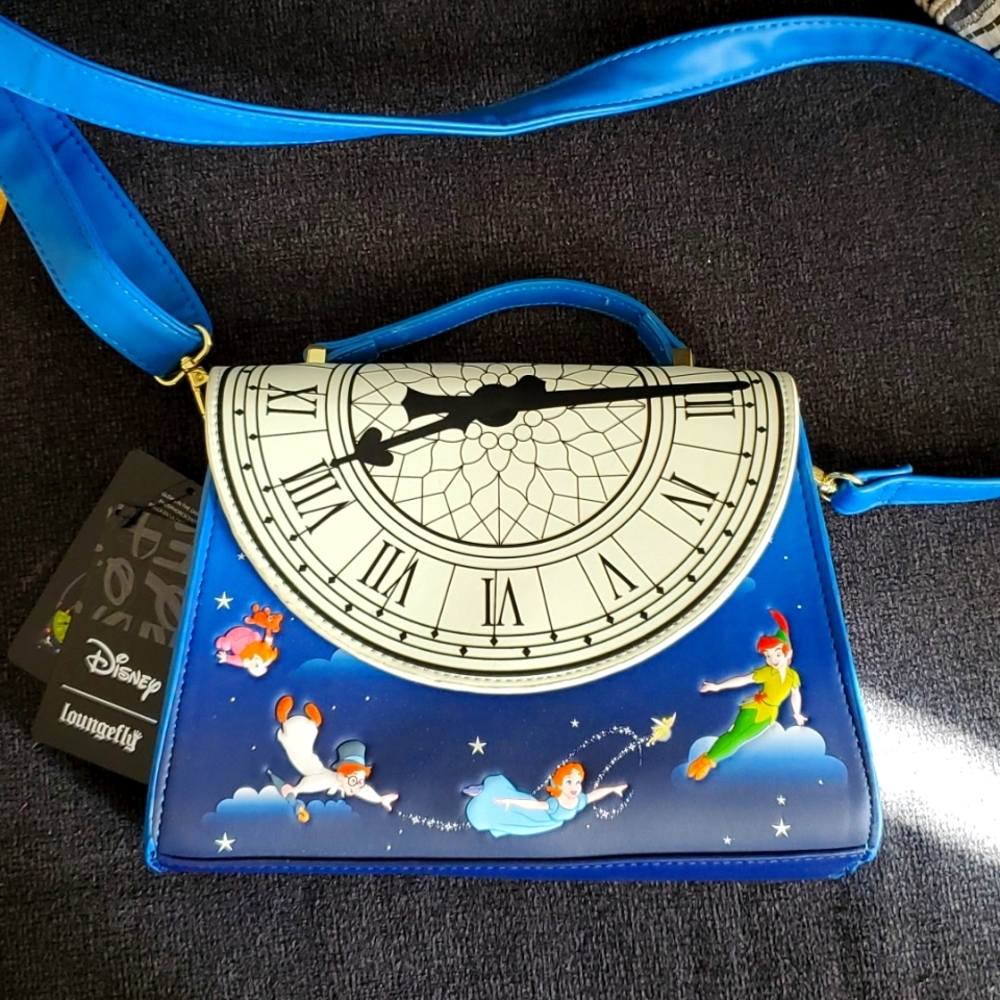 New with tags glow in the dark Loungefly peter pan purse and wallet